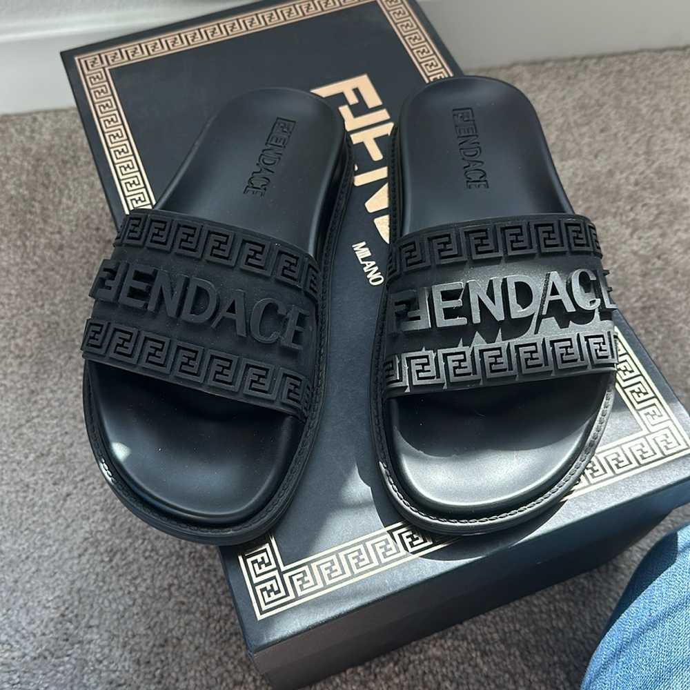 Fendi and Versace colab slides, new condition. Worn once.